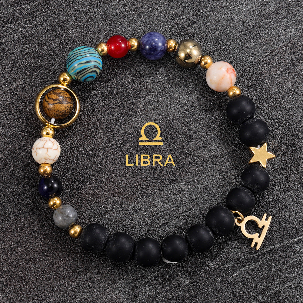 Libra zodiac gemstone bracelet with ocean jasper, black onyx, pearl accent, and gold-tone charm by Velastrand
