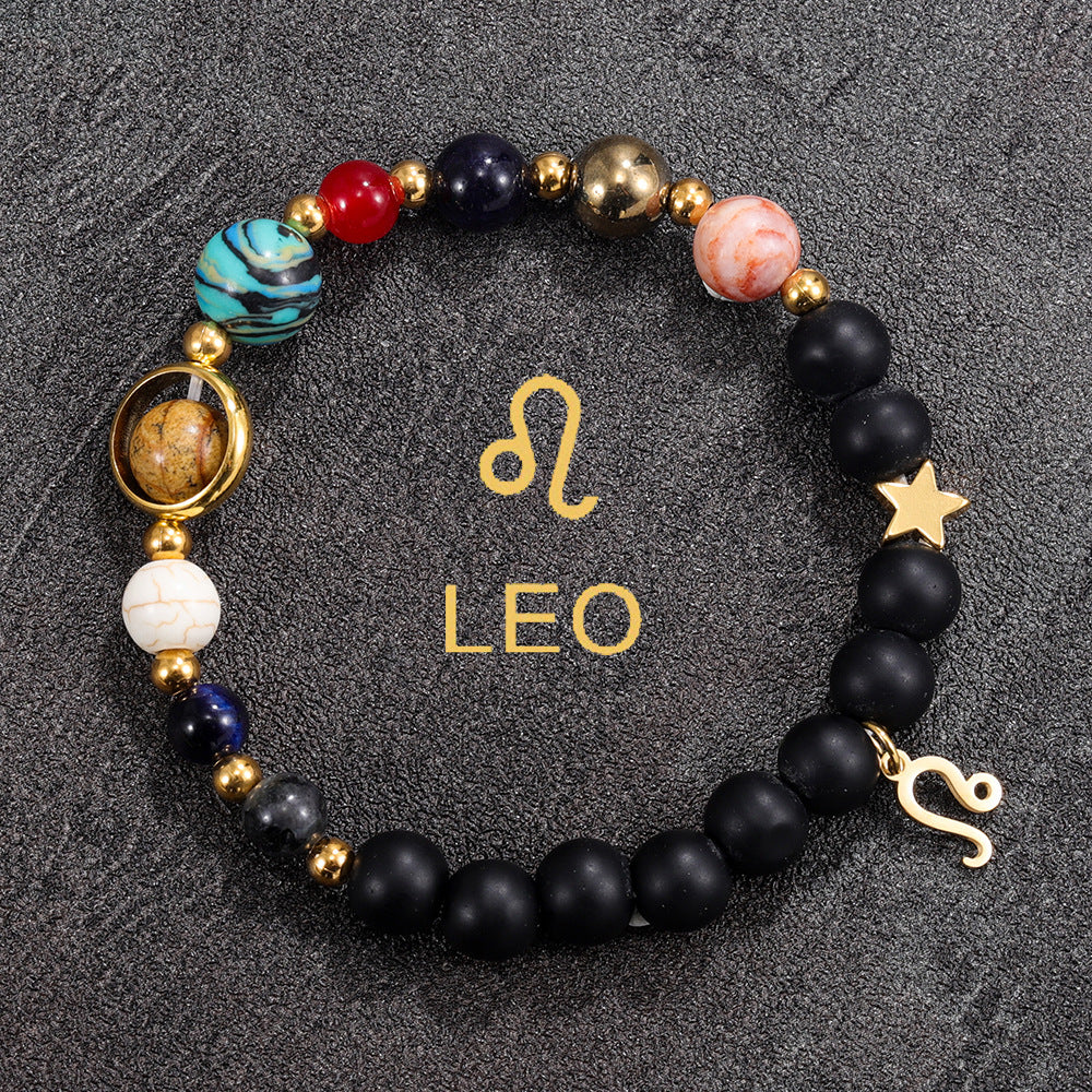Leo zodiac gemstone bracelet with tiger eye, black onyx, rose-toned stone, and gold-tone charm by Velastrand
