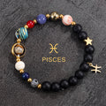 Pisces zodiac gemstone bracelet with lapis-tone bead, turquoise accent, blush detail, and gold-tone charm by Velastrand