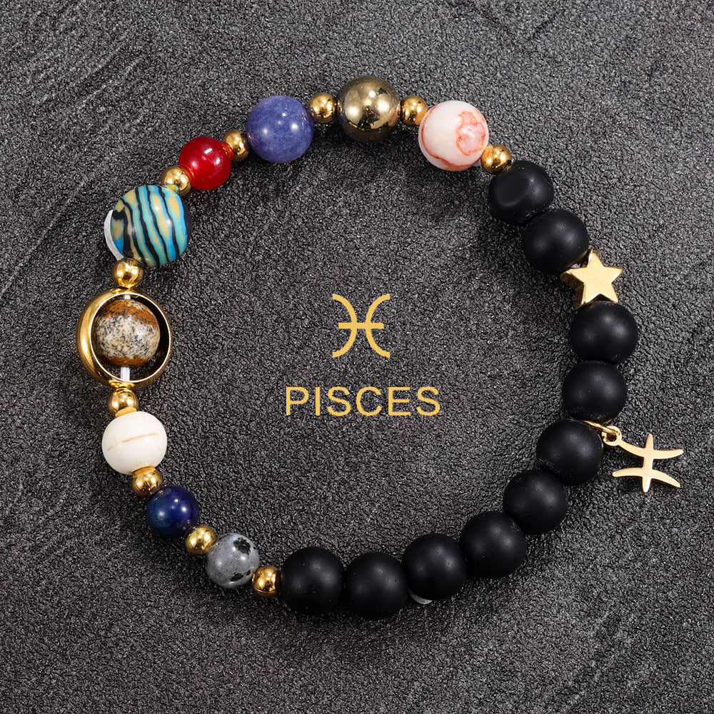 Pisces zodiac gemstone bracelet with lapis-tone bead, turquoise accent, blush detail, and gold-tone charm by Velastrand